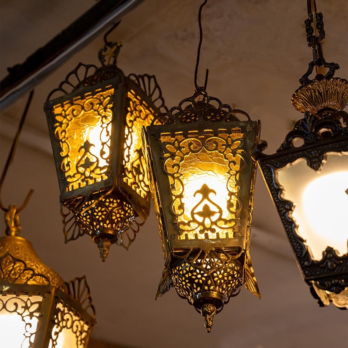 Hexagonal lantern made of brass and stained glass