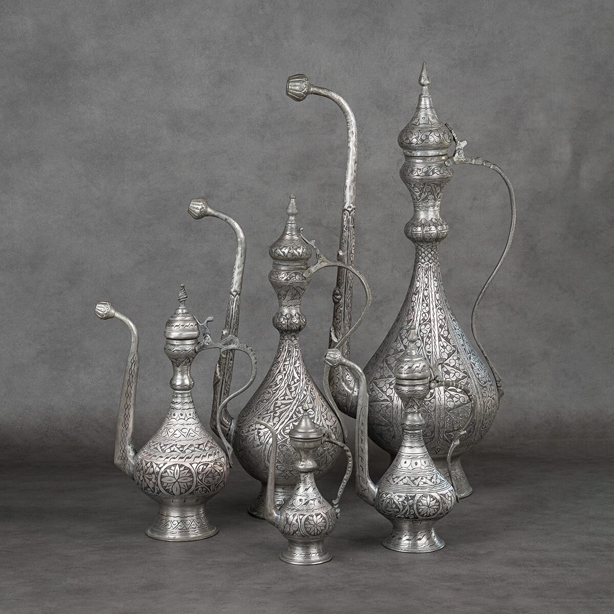 Set of Red Copper Islamic Pitchers