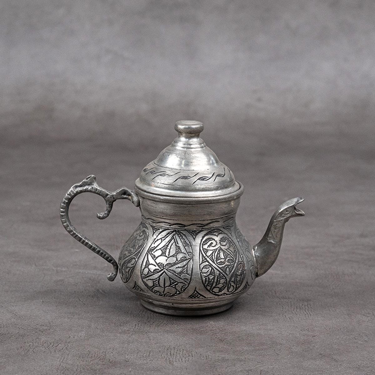 red copper teapot