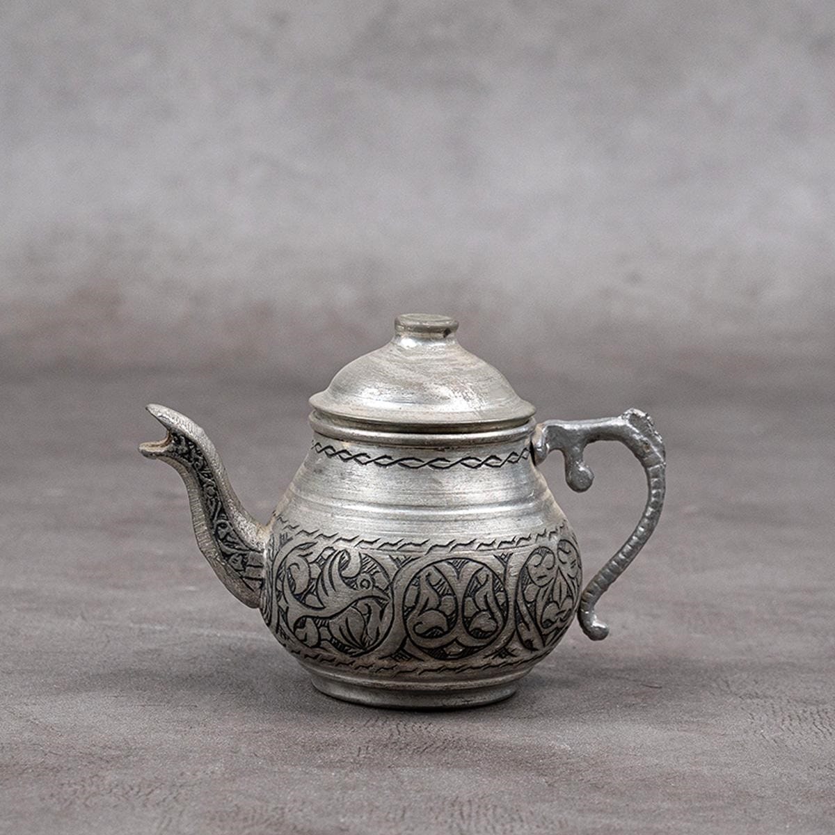 A teapot made of red copper