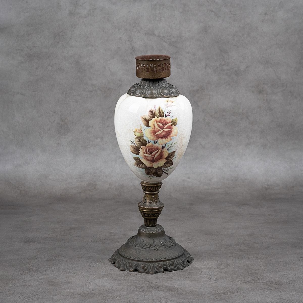 Antique lamp made of brass and porcelain