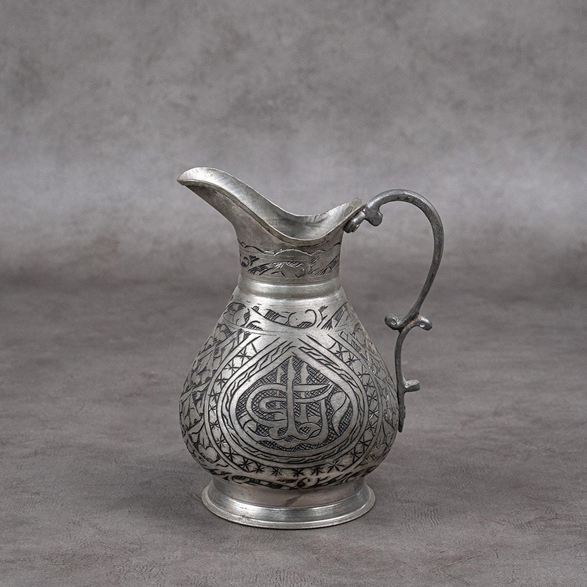 A jug made of red copper