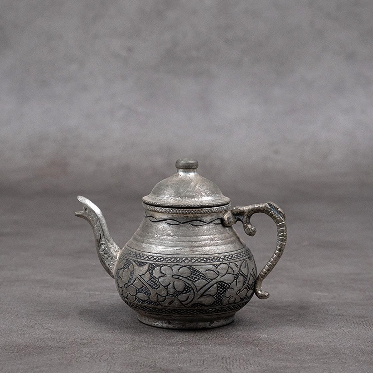 red copper teapot