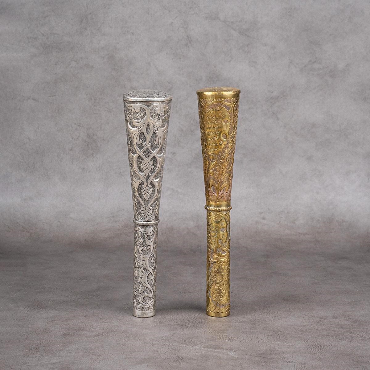 A stick handle made of brass and plated with silver