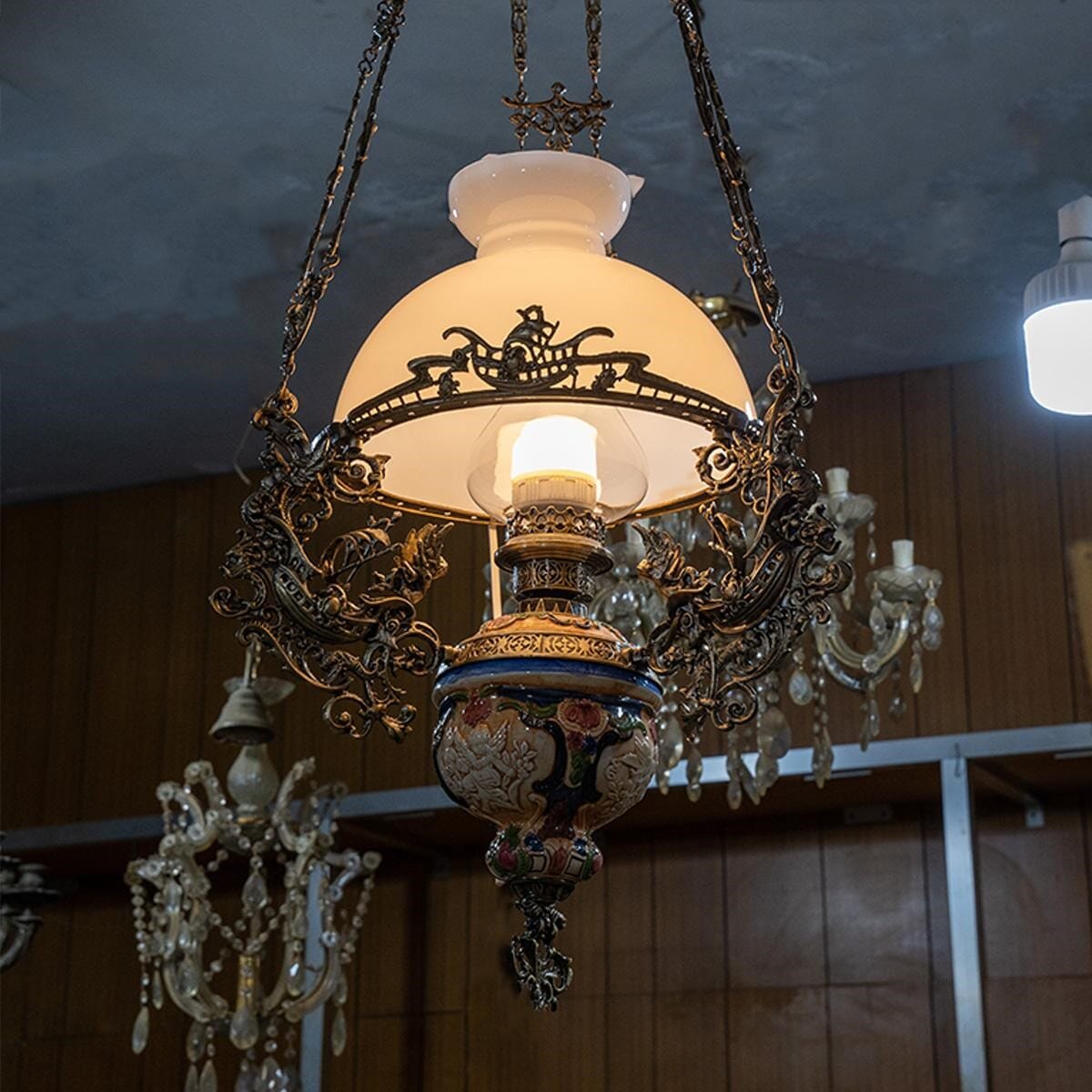 An old kerosene chandelier converted into a gas stove
