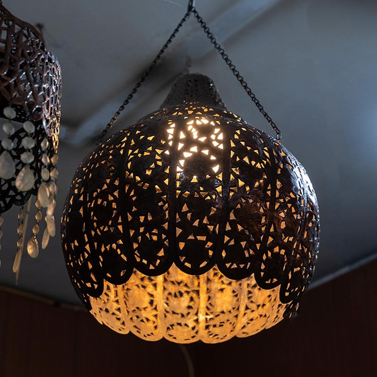 A lamp made of antique red brass