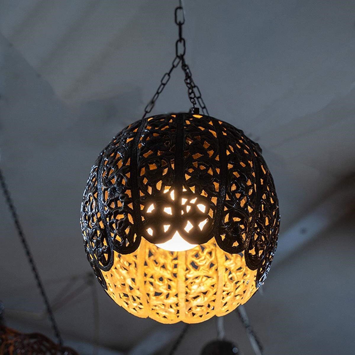 A lamp made of antique brass