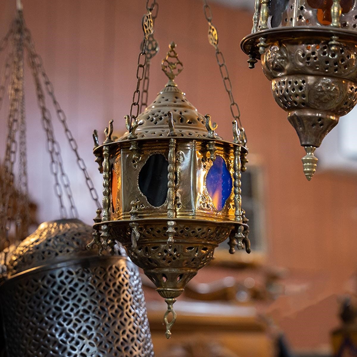 Oriental lantern made of brass and colored glass.