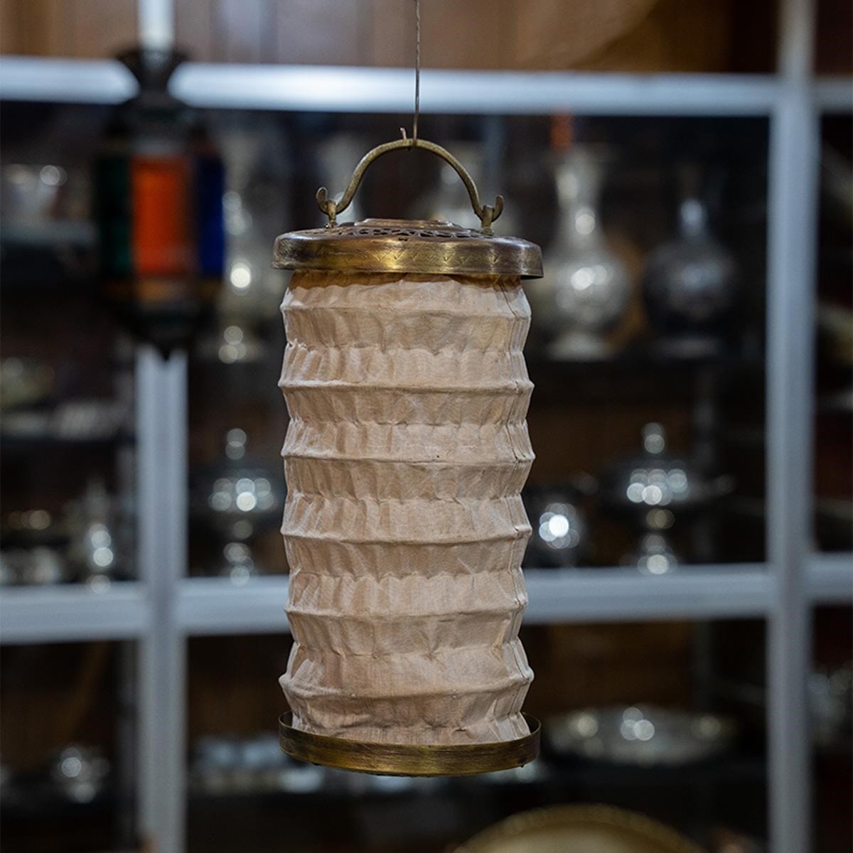 A very rare piece made of brass and heat-resistant fabric.