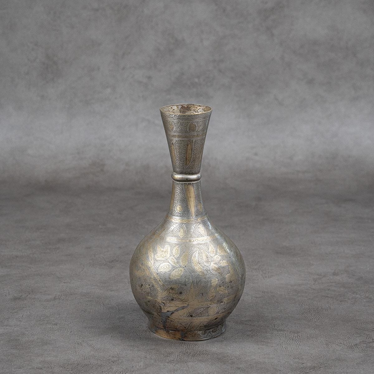 A vase made of brass and plated with silver